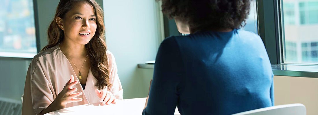 Two Women in a Meeting Two Women in a Meeting